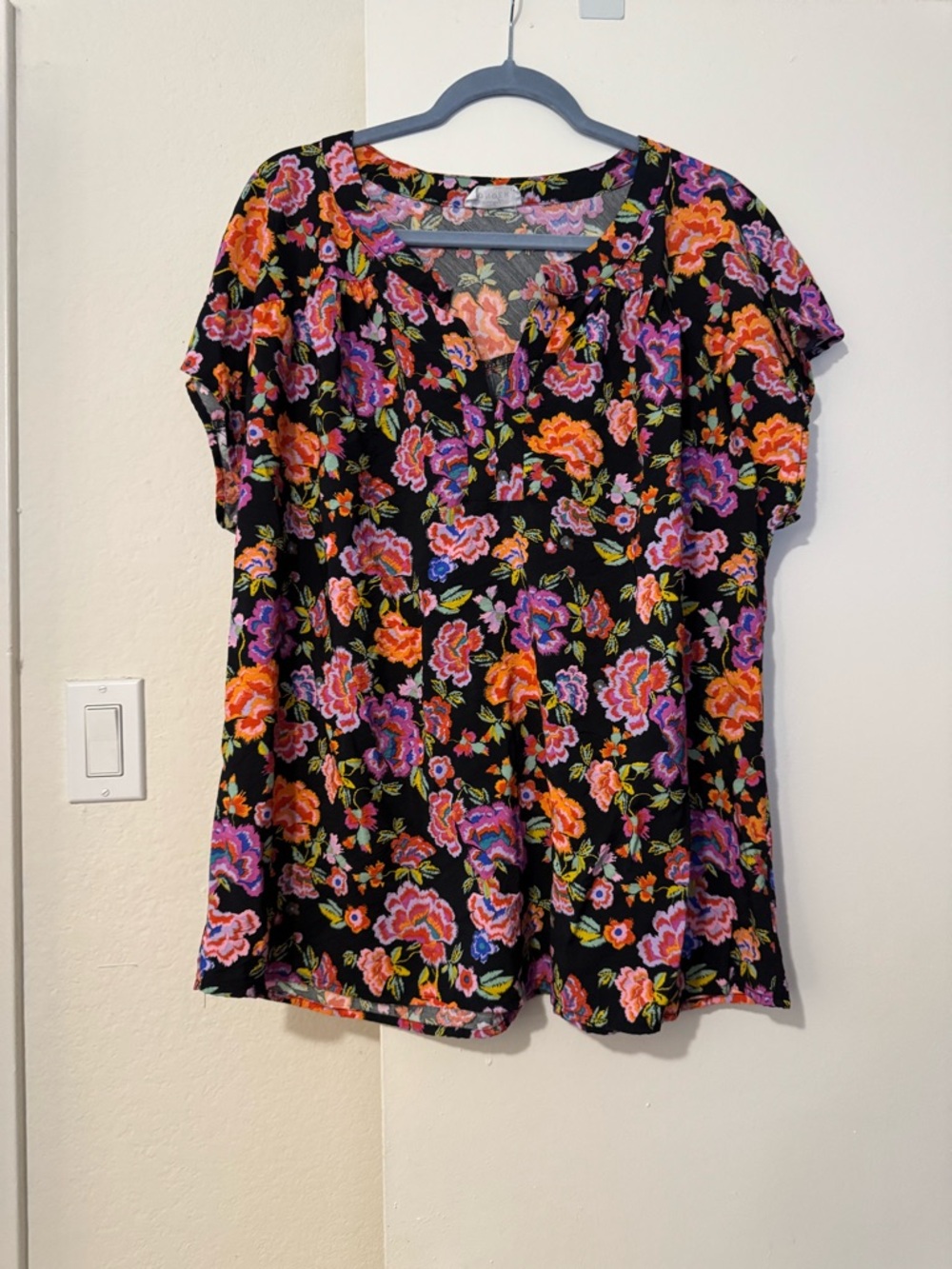 Black Floral V-Neck Flutter Sleeve Blouse with Pink & Orange Blooms